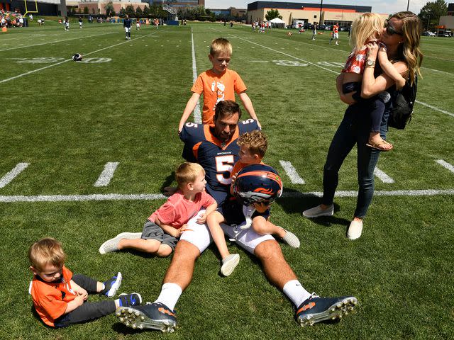 <p>Helen H. Richardson/MediaNews Group/The Denver Post/Getty</p> Joe Flacco and his wife Dana Flacco with their kids at the UCHealth Training Center on Aug. 11, 2019 in Englewood, Colorado.