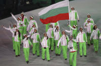 <p>Radoslav Yankov carries the flag of Bulgaria during the opening ceremony of the 2018 Winter Olympics in Pyeongchang, South Korea, Friday, Feb. 9, 2018. (AP Photo/Michael Sohn) </p>