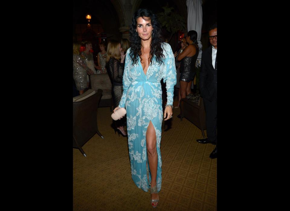 Yet another case of "Angelegging" in the wild, this time on Angie Harmon. Despite that, the leg cut-out and low neckline keep the draped dress sexy. The sky blue color suits the actress stunningly.     Los Angeles, May 2  (Photo Credit: Getty Images)