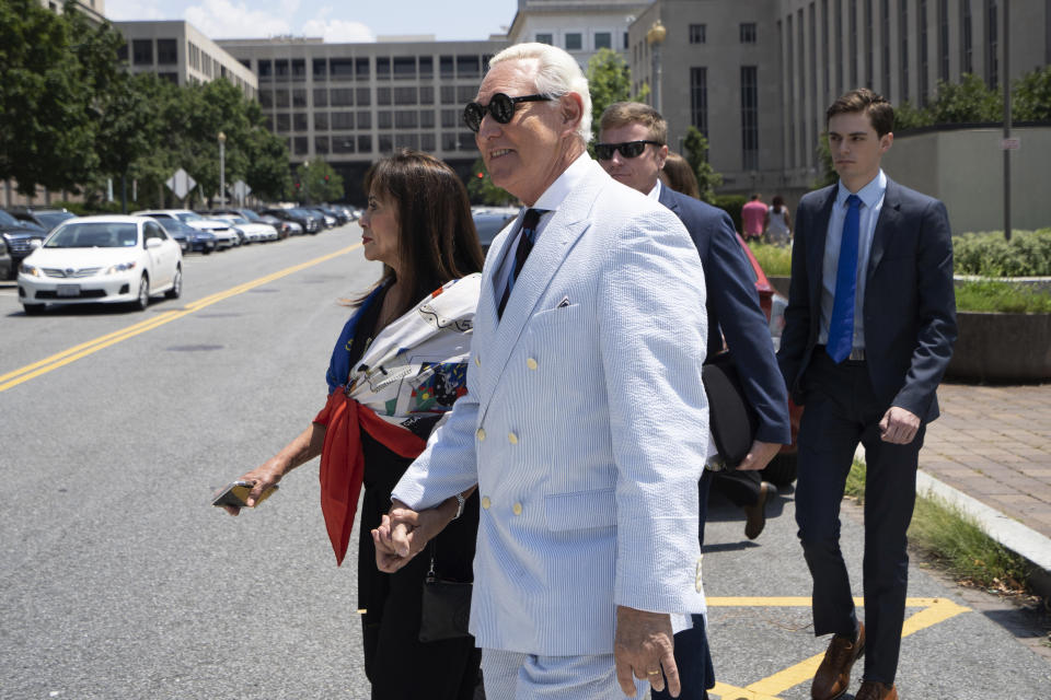 Roger Stone, a longtime confidant of President Donald Trump, accompanied by his wife, Nydia Stone, leaves federal court in Washington, Tuesday, July 16, 2019. (AP Photo/Sait Serkan Gurbuz)