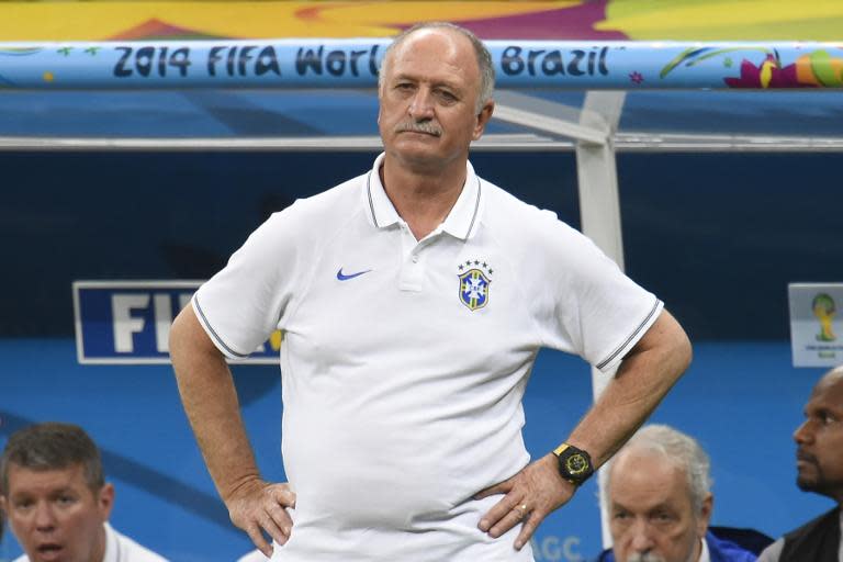 Brazil's coach Luiz Felipe Scolari reacts during the third place play-off football match between Brazil and Netherlands during the 2014 FIFA World Cup at the National Stadium in Brasilia on July 12, 2014