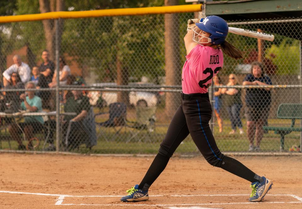 Metuchen's Abby Kozo strikes the ball in the 2023 Greater Middlesex Conference All-Star softball game at the Pitt Street Park Ponytail Field in South Plainfield on June 13, 2023.