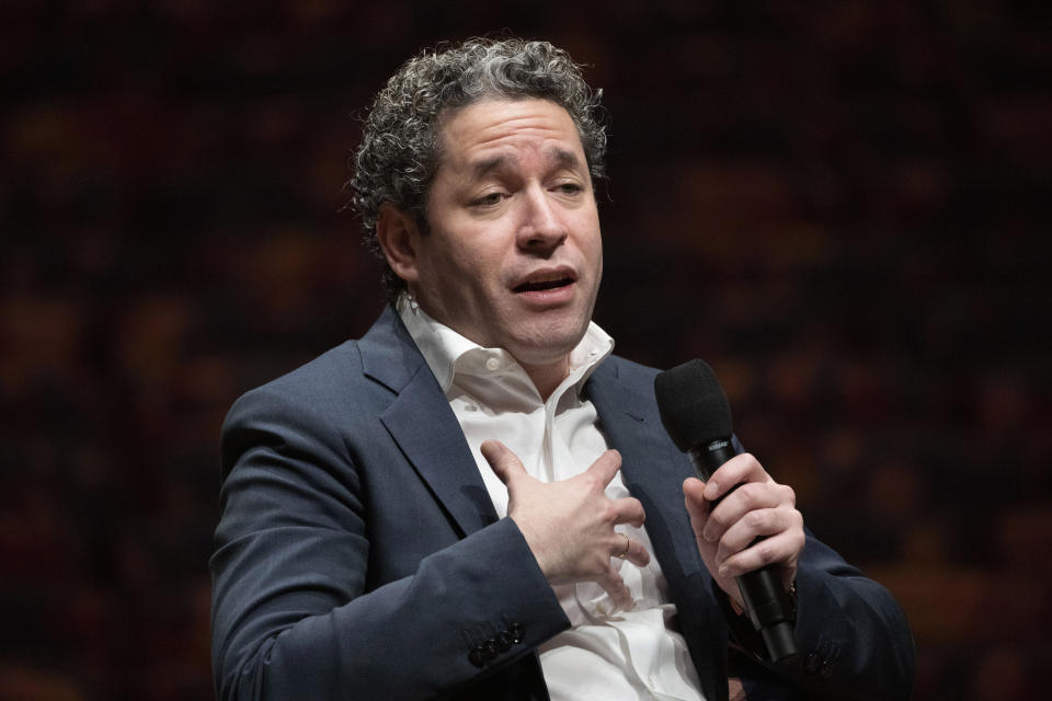 Gustavo Dudamel is introduced as the New York Philharmonic's 27th music and artistic director, Monday, Feb. 20, 2023, in the newly renovated David Geffen Hall at Lincoln Center for the Performing Arts in New York. (AP Photo/John Minchillo)