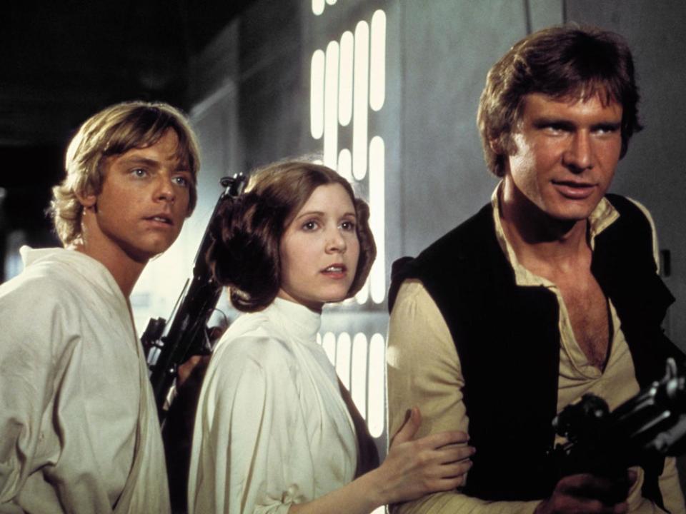 Hamill, Carrie Fisher and Harrison Ford in 'Star Wars Episode IV: A New Hope' in 1977 (Rex Features)