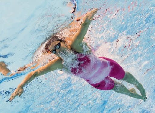 US swimmer Rebecca Soni competes to win gold and break the world record in the women's 200m breaststroke final swimming event at the London 2012 Olympic Games in London