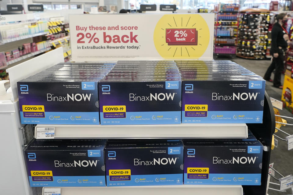 Boxes of BinaxNow home COVID-19 tests made by Abbott are shown for sale Monday, Nov. 15, 2021, at a CVS store in Lakewood, Wash., south of Seattle. After weeks of shortages, retailers like CVS say they now have ample supplies of rapid COVID-19 test kits, but experts are bracing to see whether it will be enough as Americans gather for Thanksgiving and new outbreaks spark across the Northern and Western states. (AP Photo/Ted S. Warren)