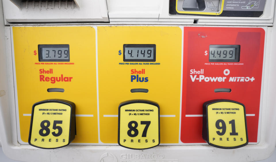 FILE - The per-gallon price is displayed electronically at the pump of a Shell station, July 5, 2023, in Englewood, Colo. According to a raft of polls and surveys, most Americans hold a glum view of the economy. (AP Photo/David Zalubowski, File)