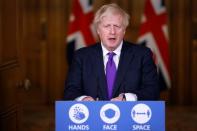 Britain's PM Johnson attends a news conference in London