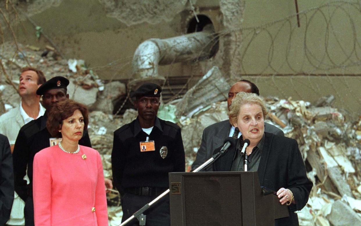 US Secretary of State Madeleine Albright (R) and Ambassador to Kenya Prudence Bushne (L) address Kenyan's at the bomb-damaged area near the US Embassy in Nairobi in 1998 - Reuters