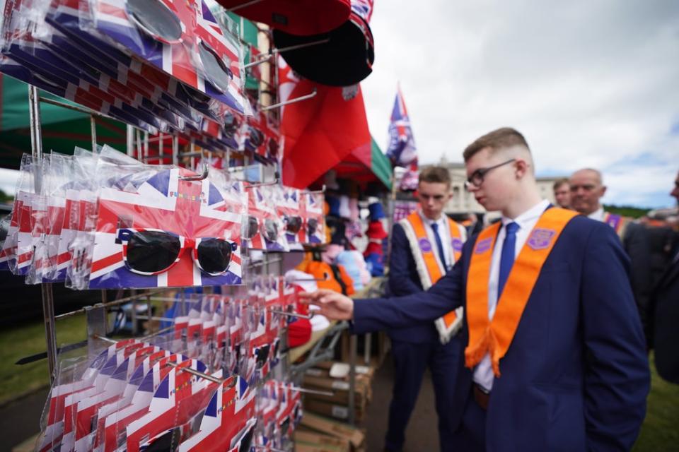 Merchandise on sale at Stormont before the start of the Northern Ireland centenary parade (Niall Carson/PA) (PA Wire)