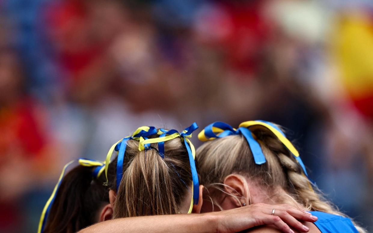 Team Ukraine competes in the women's 4 x 400m relay heat during the European Athletics Championships at the Olympic stadium in Rome