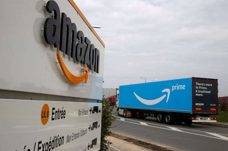 FILE PHOTO: A truck bearing the Amazon Prime logo arrives at the Amazon logistics center in Lauwin-Planque