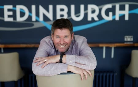 Comedian Mark Nelson poses for a photograph during an interview in Edinburgh