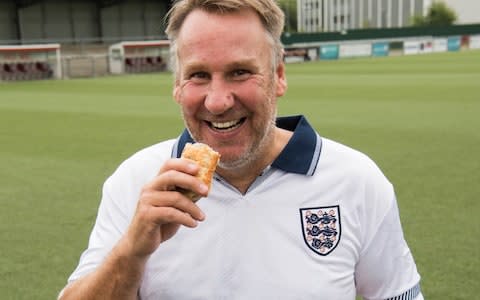 Paul Merson munches a sausage roll - Credit: ITV
