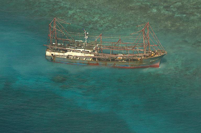 Photo released on April 10, 2013 shows the Chinese fishing boat that ran aground off Tubbataha reef, in Palawan island, Western Philippines