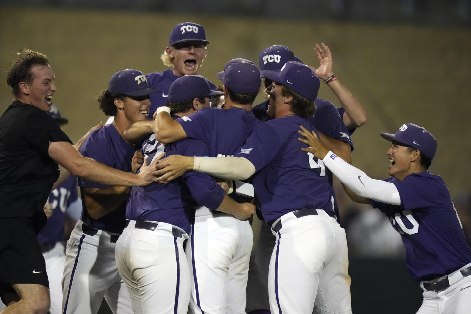 TCU celebrates after winning an NCAA college baseball tournament super regional game against Indiana State in Fort Worth, Texas, Saturday, June 10, 2023. (AP Photo/LM Otero)
