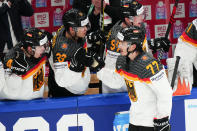 Germany's Daniel Fischbuch (77) celebrates his goal during the gold medal match against Canada at the Ice Hockey World Championship in Tampere, Finland, Sunday, May 28, 2023. (AP Photo/Pavel Golovkin)