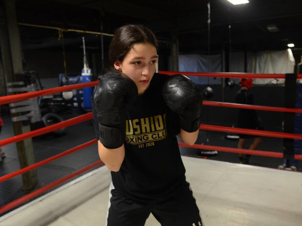 April Kelly is a 14-year-old boxer from London. The grade 9 student is undefeated so far, but says there's pressure to keep that record going.  (Michelle Both/CBC - image credit)