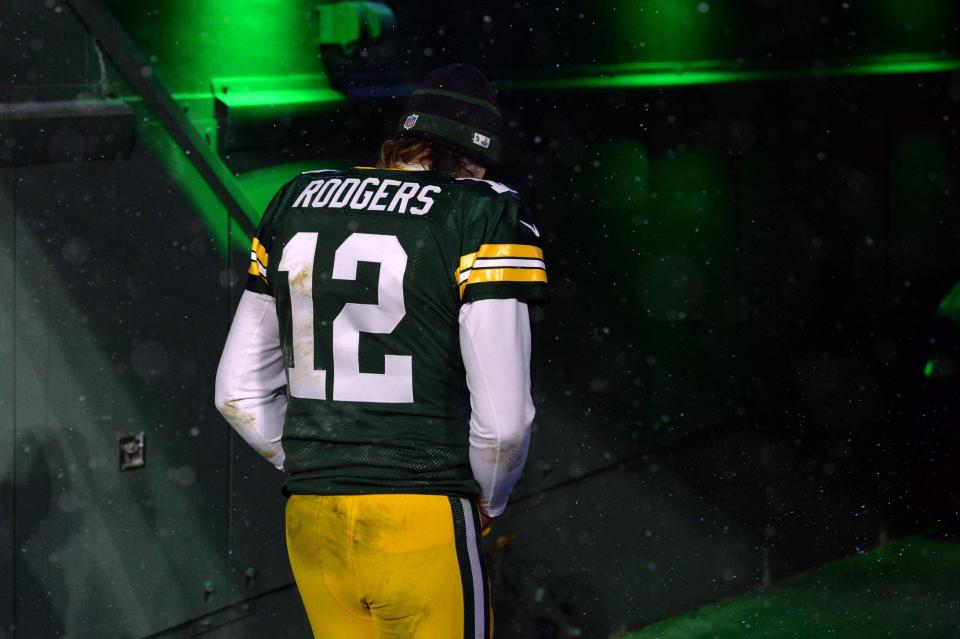 Green Bay Packers quarterback Aaron Rodgers (12) exits the field after losing to the San Francisco 49ers during a NFC Divisional playoff football game at Lambeau Field.