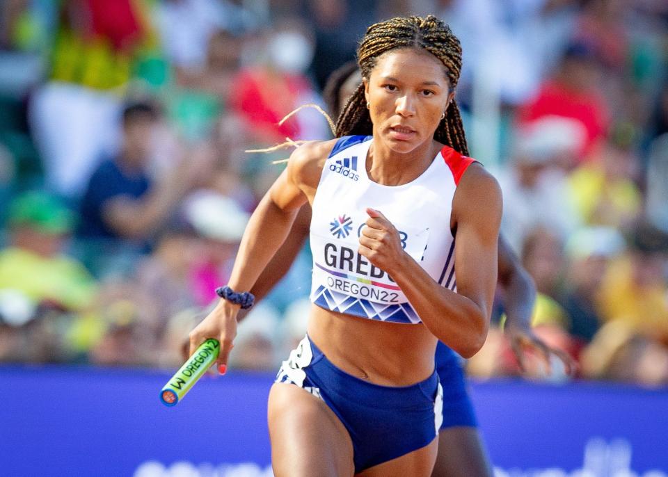 France’s Shana Grebo takes off on the second leg during the first round of the women’s 4x400 meter relay at the World Athletics Championships Saturday, July 23, 2022 at Hayward Field in Eugene, Ore.