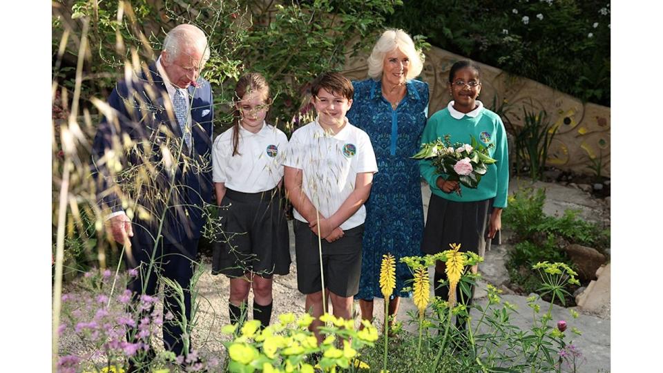 Charles and Camilla meet children in the No Parents Allowed garden