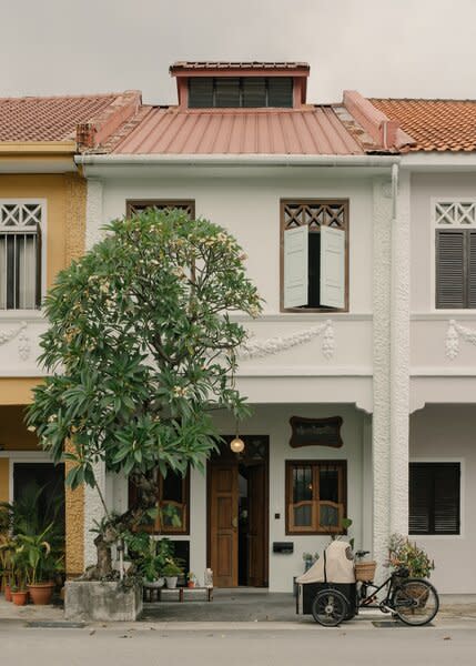 After: "I think the design on the facade of our shophouse suits us. We tend to prefer simple and understated designs," says Kelvin on the shophouse's facade that is less elaborate than some others in the area.  