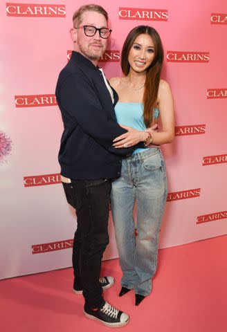 <p>Olivia Wong/Getty</p> Macaulay Culkin and Brenda Song attend a Clarins launch event on March 15, 2024
