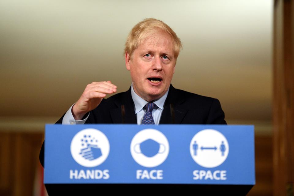 Britain's Prime Minister Boris Johnson speaks during a virtual press conference inside 10 Downing Street in central London on October 20, 2020. - British Prime Minister Boris Johnson said on Tuesday he will impose tougher coronavirus restrictions on the English city of Manchester, defying local leaders who oppose the move without greater financial help. Johnson said the city region of around 2.8 million residents would enter the highest risk category this weekend but, for the first time under a new system of localised curbs, would do so without the support its mayor and other leaders. (Photo by Leon Neal / POOL / AFP) (Photo by LEON NEAL/POOL/AFP via Getty Images)