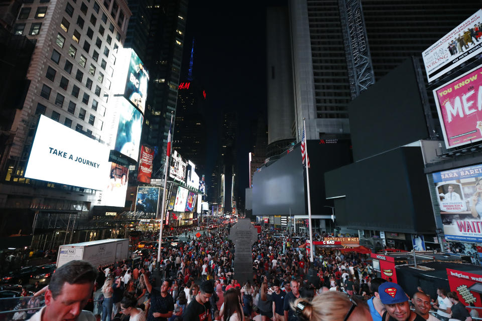 Screens in Times Square are black during a power outage, Saturday, July 13, 2019, in New York. Authorities were scrambling to restore electricity to Manhattan following a power outage that knocked out Times Square's towering electronic screens and darkened marquees in the theater district and left businesses without electricity, elevators stuck and subway cars stalled. (Photo: Michael Owens/AP)