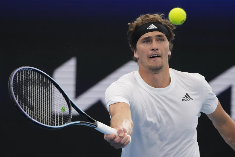 Germany's Alexander Zverev plays a forehand return to United States' Taylor Fritz during their Group C match at the United Cup tennis event in Sydney, Australia, Monday, Jan. 2, 2023. (AP Photo/Mark Baker)
