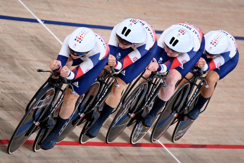 <p>TOPSHOT - Great Britain's team compete during the women's track cycling team pursuit finals during the Tokyo 2020 Olympic Games at Izu Velodrome in Izu, Japan, on August 3, 2021. (Photo by Peter PARKS / AFP) (Photo by PETER PARKS/AFP via Getty Images)</p> 