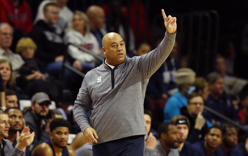Penn State head coach Micah Shrewsberry instructs his team as they play Rutgers during the first half of an NCAA college basketball game in Piscataway, N.J. Tuesday, Jan. 24, 2023. (AP Photo/Noah K. Murray)