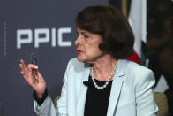 California Sen. Dianne Feinstein, D-Calif., gestures while speaking to California Sen. Kevin de Leon, D-Los Angeles, during a debate on Wednesday, Oct. 17, 2018, in San Francisco. Feinstein shared the stage with an opponent for the first time since 2000 when she debated state Sen. Kevin de Leon.The two Democrats are facing off in the Nov. 6 election. (AP Photo/Ben Margot)