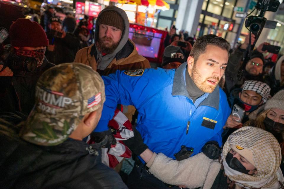 Protestors caught in a crush as police attempt to turn them around (Getty Images)