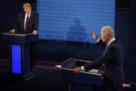 President Donald Trump listens to Democratic presidential candidate former Vice President Joe Biden during the first presidential debate Tuesday, Sept. 29, 2020, at Case Western University and Cleveland Clinic, in Cleveland, Ohio. (AP Photo/Morry Gash, Pool)