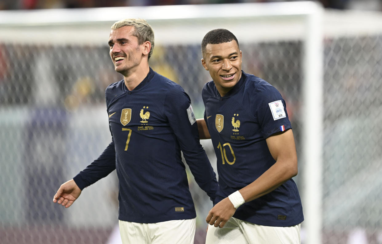 AL WAKRAH, QATAR - NOVEMBER 22: Kylian Mbappe (10) of France celebrates with his teammate Antoine Griezmann (L) after after scoring a goal during the FIFA World Cup 2022 Group D match between France and Australia at Al Janoub Stadium in Al Wakrah, Qatar on November 22, 2022. (Photo by ErÃ§in ErtÃ¼rk/Anadolu Agency via Getty Images)
