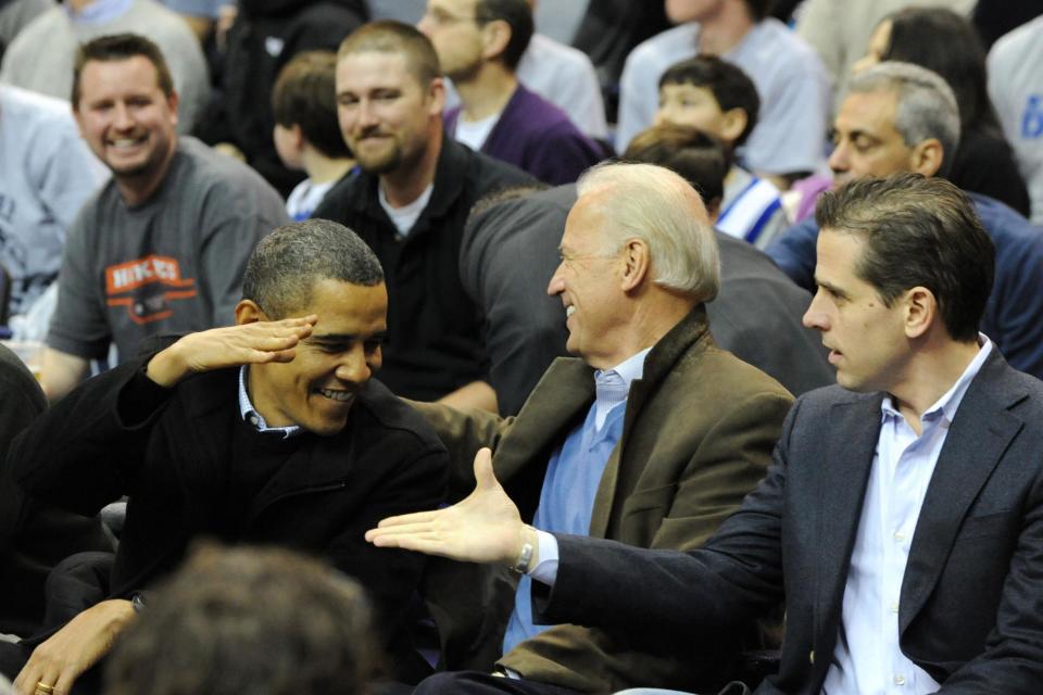 Hunter (right) with Joe Biden and Barack Obama in 2010