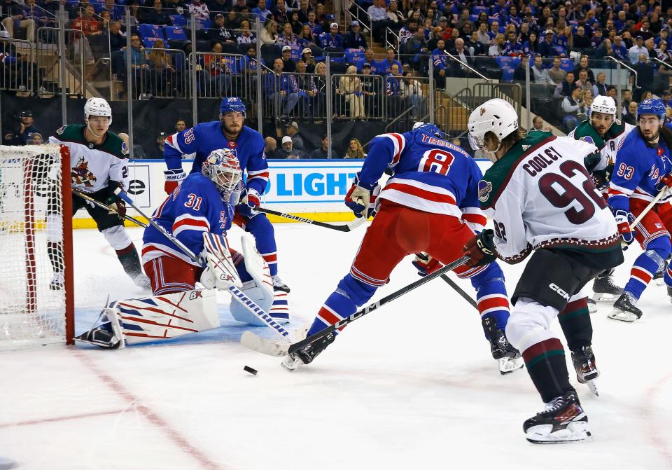 Igor Shesterkin #31 of the New York Rangers stops a first period shot by Logan Cooley #92 of the Arizona Coyotes at Madison Square Garden on Oct. 16, 2023 in New York City.