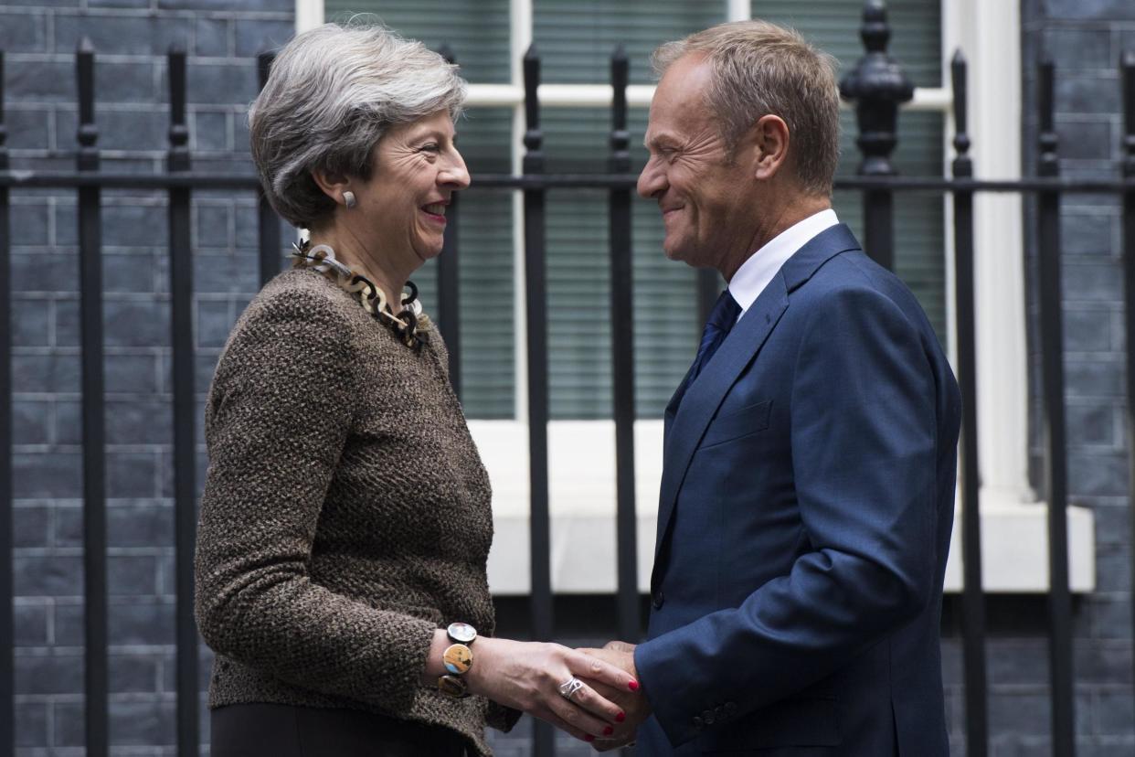 Donald Tusk: After meeting with Theresa May, the European Council president said Britain's philosophy of having 'cake and eating it' is over: EPA