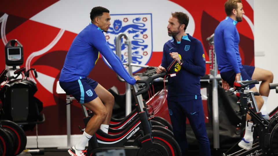 Southgate talks to Alexander-Arnold in the gym at St George's Park on October 11, 2023. - Eddie Keogh/The FA/Getty Images