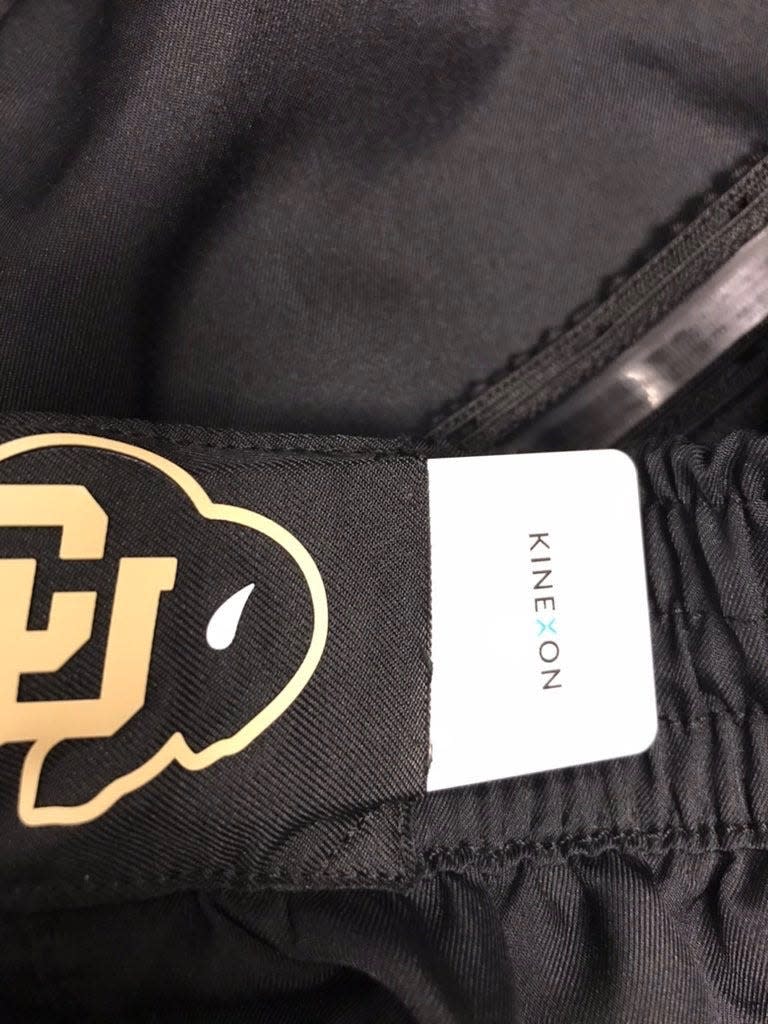 Some schools have made pockets for players to put their SafeTags in, like the Colorado Buffaloes.