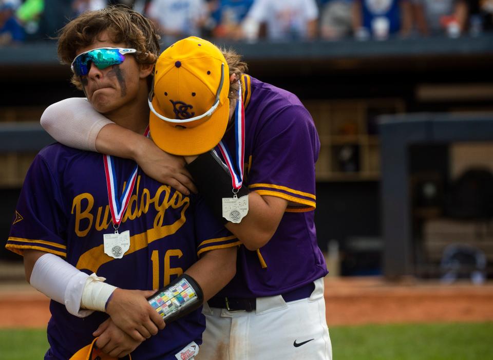 Bloom-Carroll's Tyler Parks (1) embraces teammate Ayden Anderson (16) during the Bulldogs' Division II state title game when they were sophomores. Both players are seniors now and are expected to lead the way for the Bulldogs, who have an experienced and talented team.