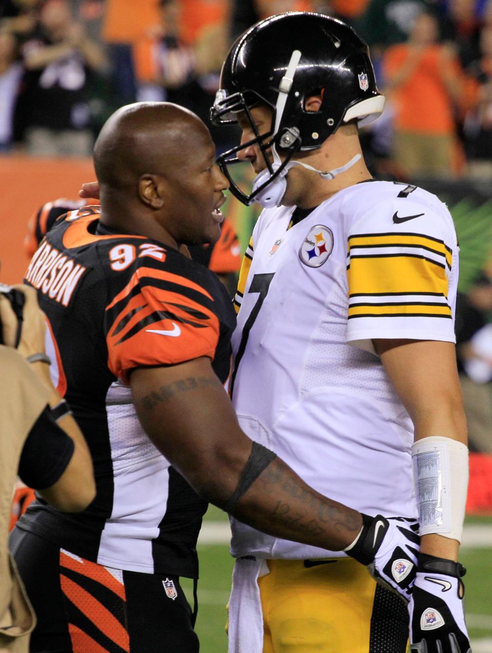 Bengals outside linebacker James Harrison hugs Steelers quarterback Ben Roethlisberger after the Bengals defeated the Steelers on Sept. 16, 2013, in Cincinnati.