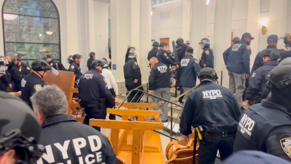 Footage from inside Hamilton Hall shows a swarm of officers entering the college building. NYPD