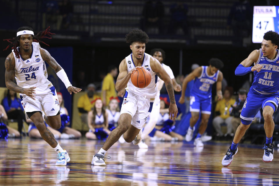 Tulsa guard PJ Haggerty (4) brings the ball up after a steal against Tulsa during the second half of an NCAA college basketball game Thursday, Jan. 4, 2024, in Tulsa, Okla. (AP Photo/Joey Johnson)