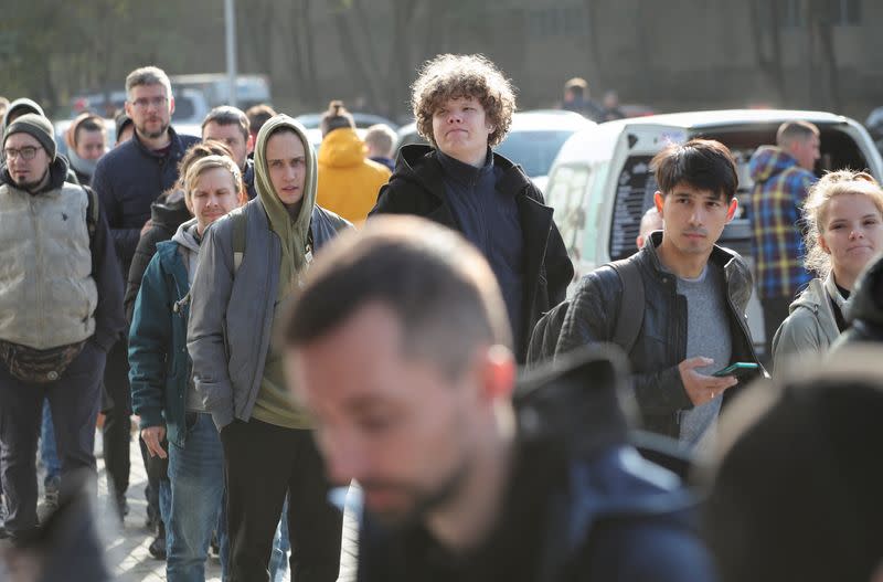 Russian citizens visit a public service centre in Almaty