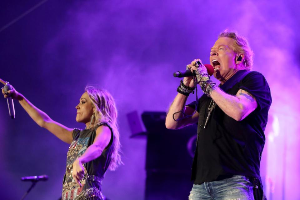 Special guest Axl Rose of Guns N' Roses performs with headliner Carrie Underwood at Stagecoach country music festival in Indio, Calif., on Saturday, April 30, 2022.