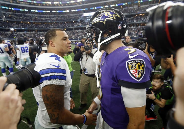 Joe Flacco greets Dak Prescott after Dallas beat Baltimore on Sunday (AP)