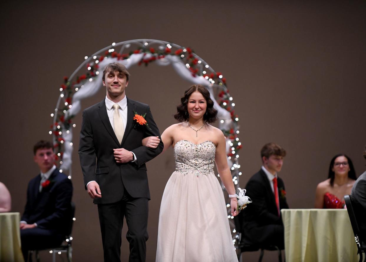 Washington High Outstanding Senior Boy candidate Zack Liebler and Miss Massillonian candidate Anna Rivera are introduced at the formal ceremony.