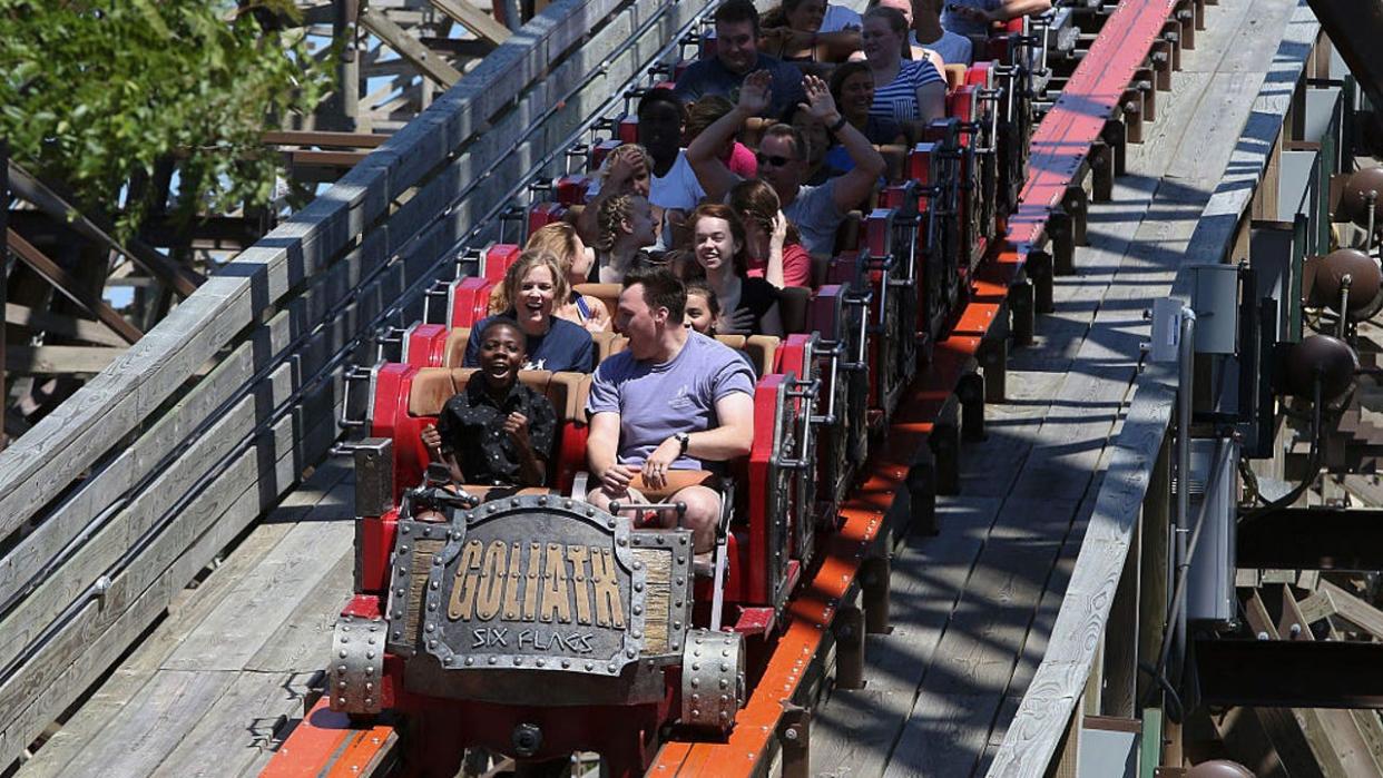 <div>CHICAGO, IL - AUGUST 08: Members of Big Brothers, Big Sisters, ride Goliath, the worldÕs tallest, steepest and fastest wooden roller coaster at Six Flags Great America, thanks to Wyndham Rewards on August 8, 2016 in Chicago, Illinois. (Photo by Tasos Katopodis/Getty Images for Wyndham Rewards)</div>